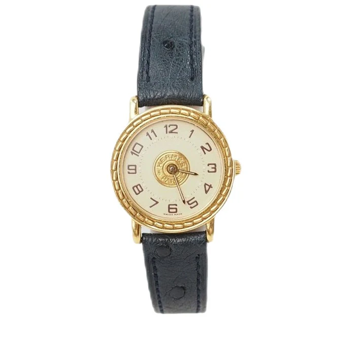 Montre HERMÈS "Sellier" en or jaune en cuir d'autruce