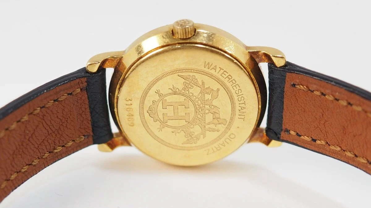 Montre HERMÈS "Sellier" en or jaune en cuir d'autruce - Image 7