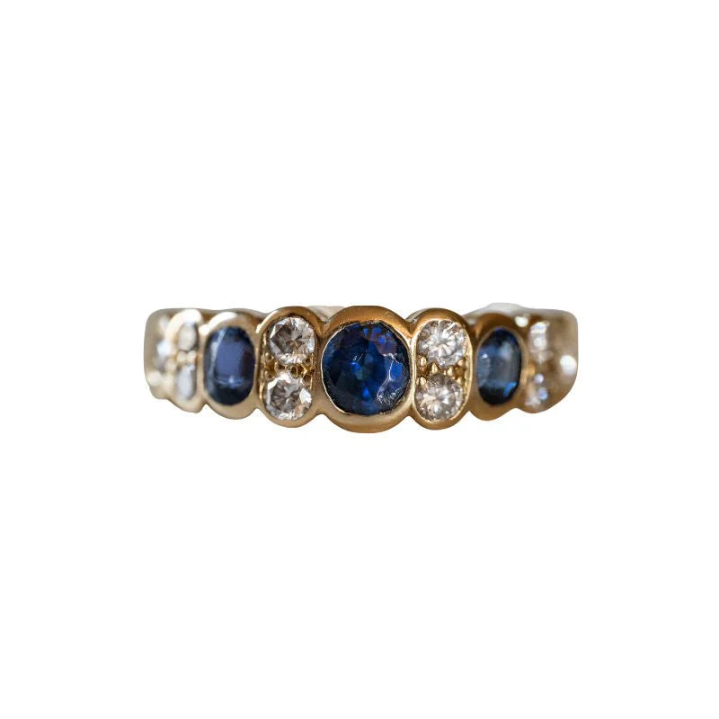 Bague VAN CLEEF & ARPELS en or jaune, saphirs et diamants