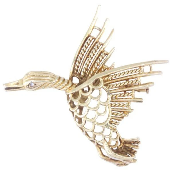Broche Canard en or jaune et diamant