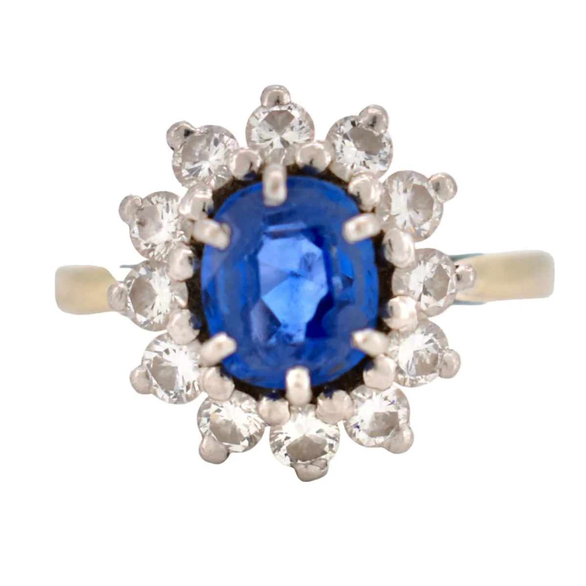 Bague Marguerite en or blanc, platine, saphir et diamants