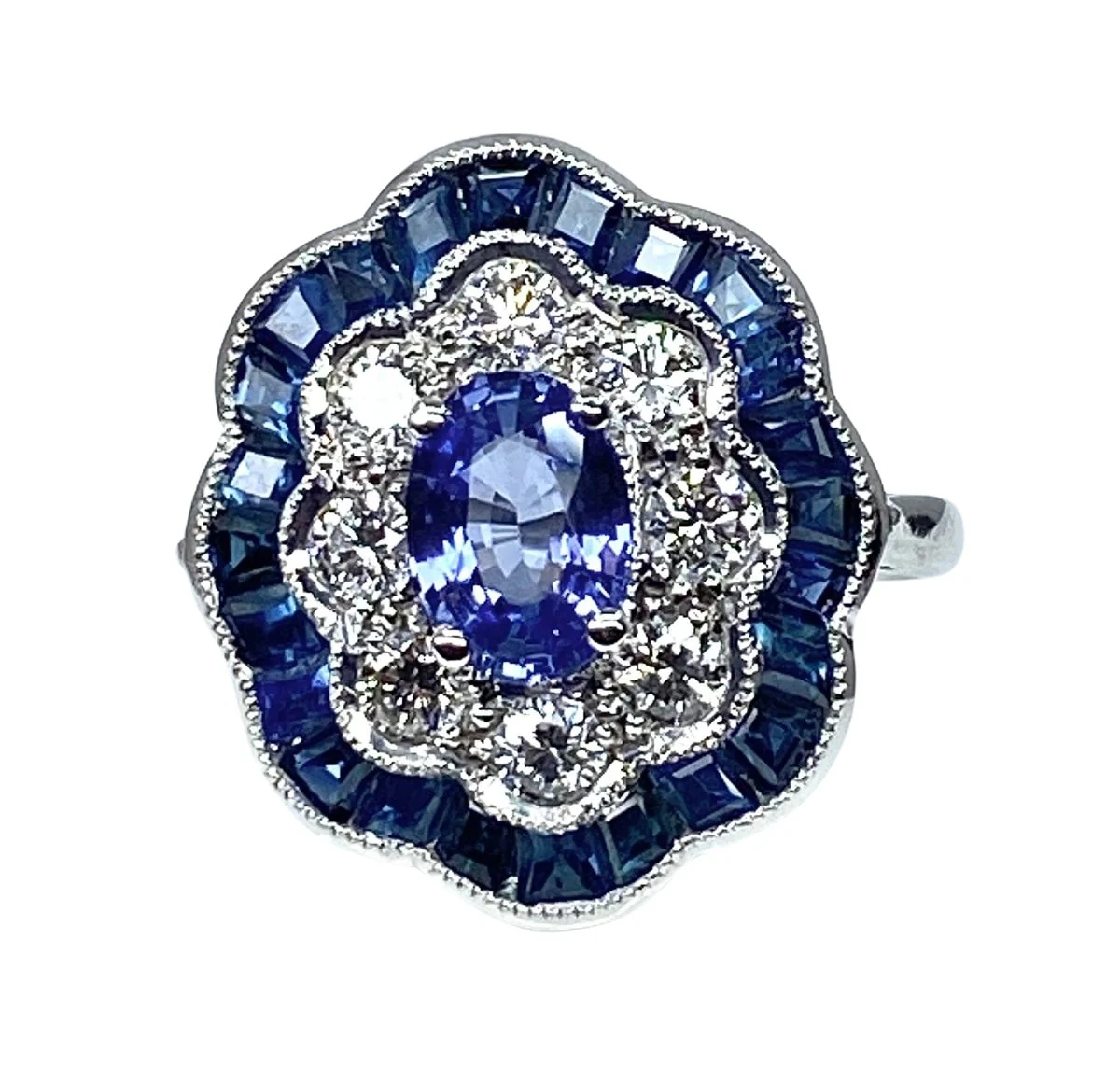 Bague marguerite en or blanc 18 carats en saphirs et diamants