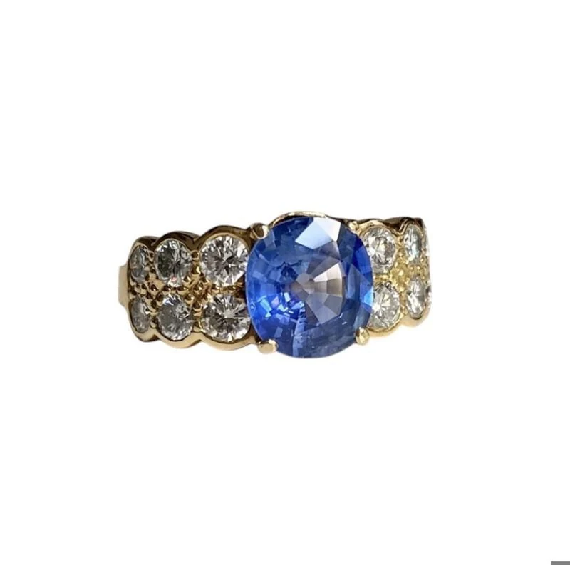 Bague Solitaire en or jaune, saphir et diamants