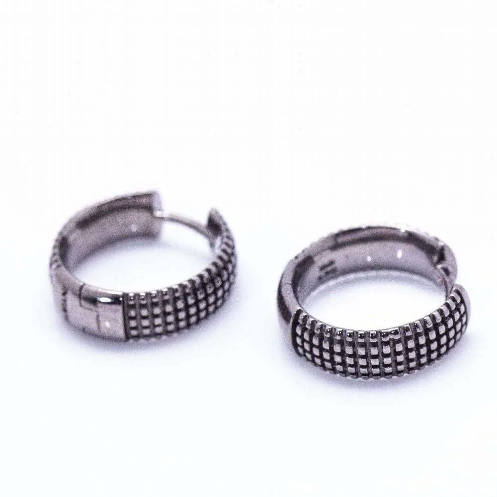 Boucles d'oreilles DAMIANI en or noir. D'occasion