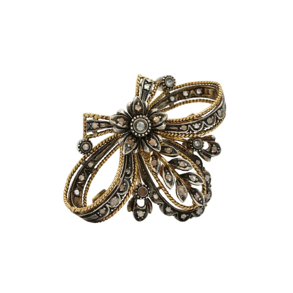 Broche Épingle en or jaune, argent et diamant