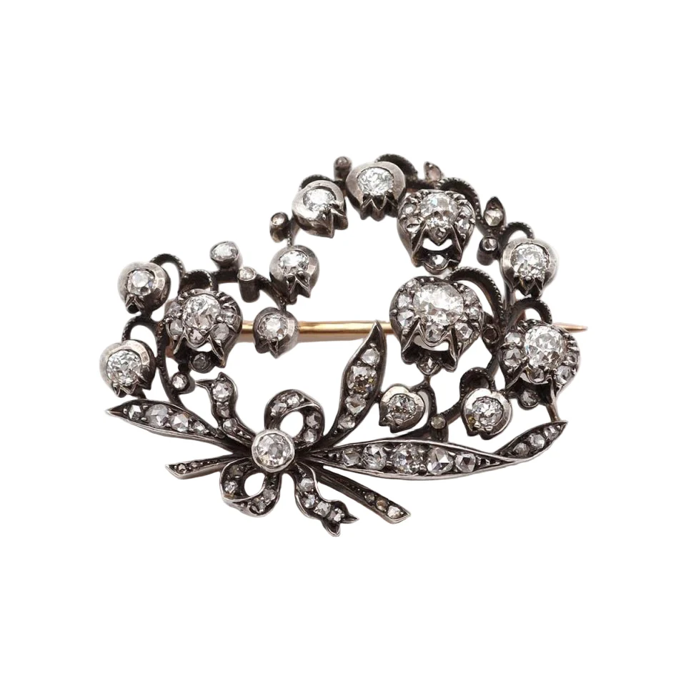 Broche Épingle en or jaune, argent et diamants