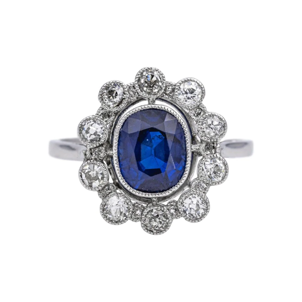 Bague Marguerite en platine, saphir et diamants