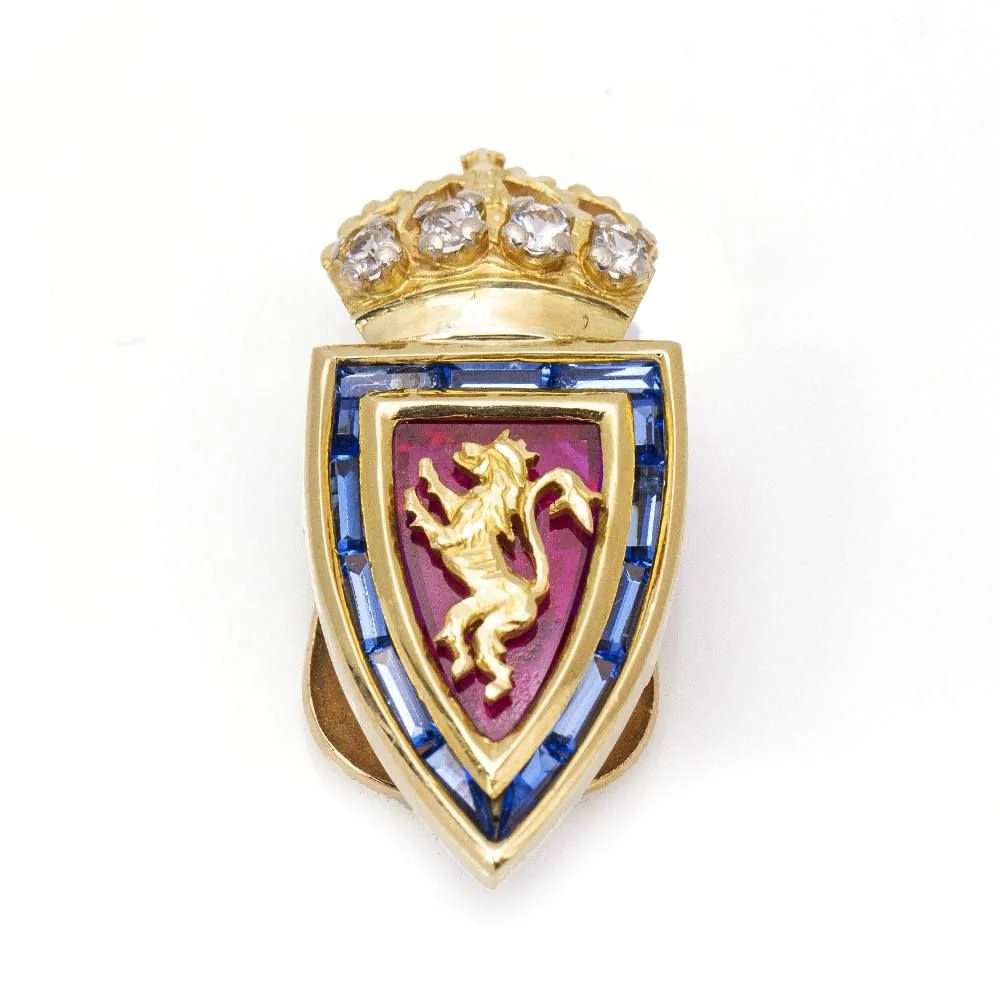 Broche Clip en or, rubis, saphirs et diamants