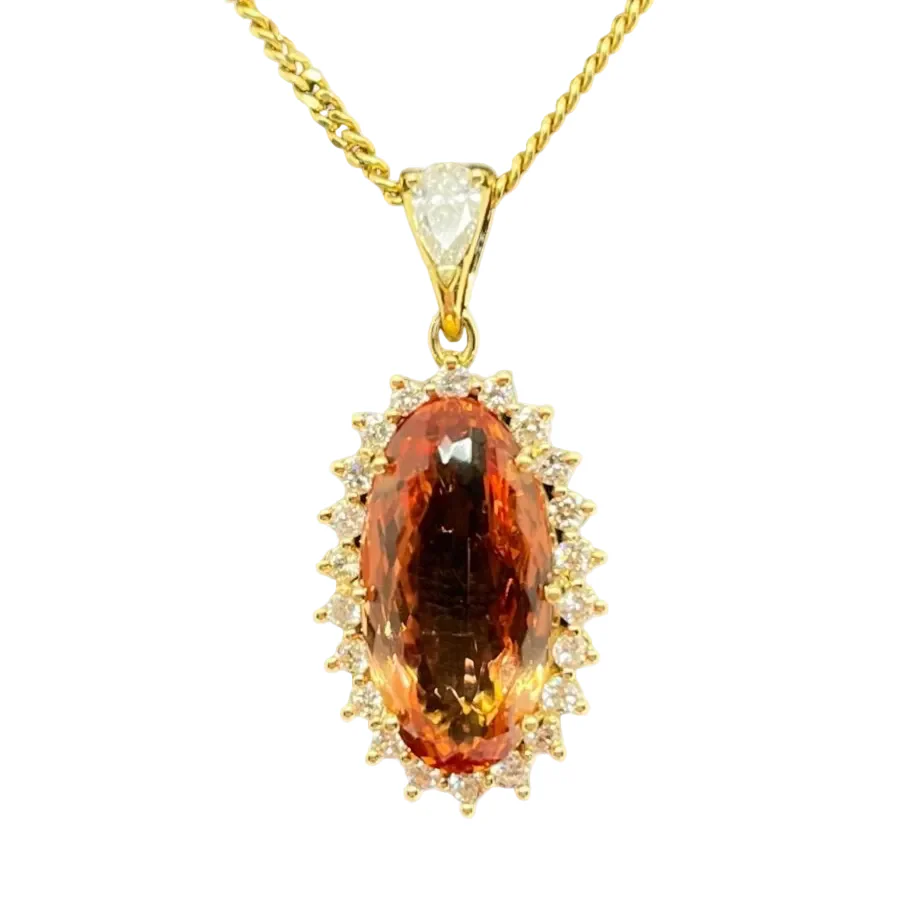 Pendentif en or jaune, topaze et diamants