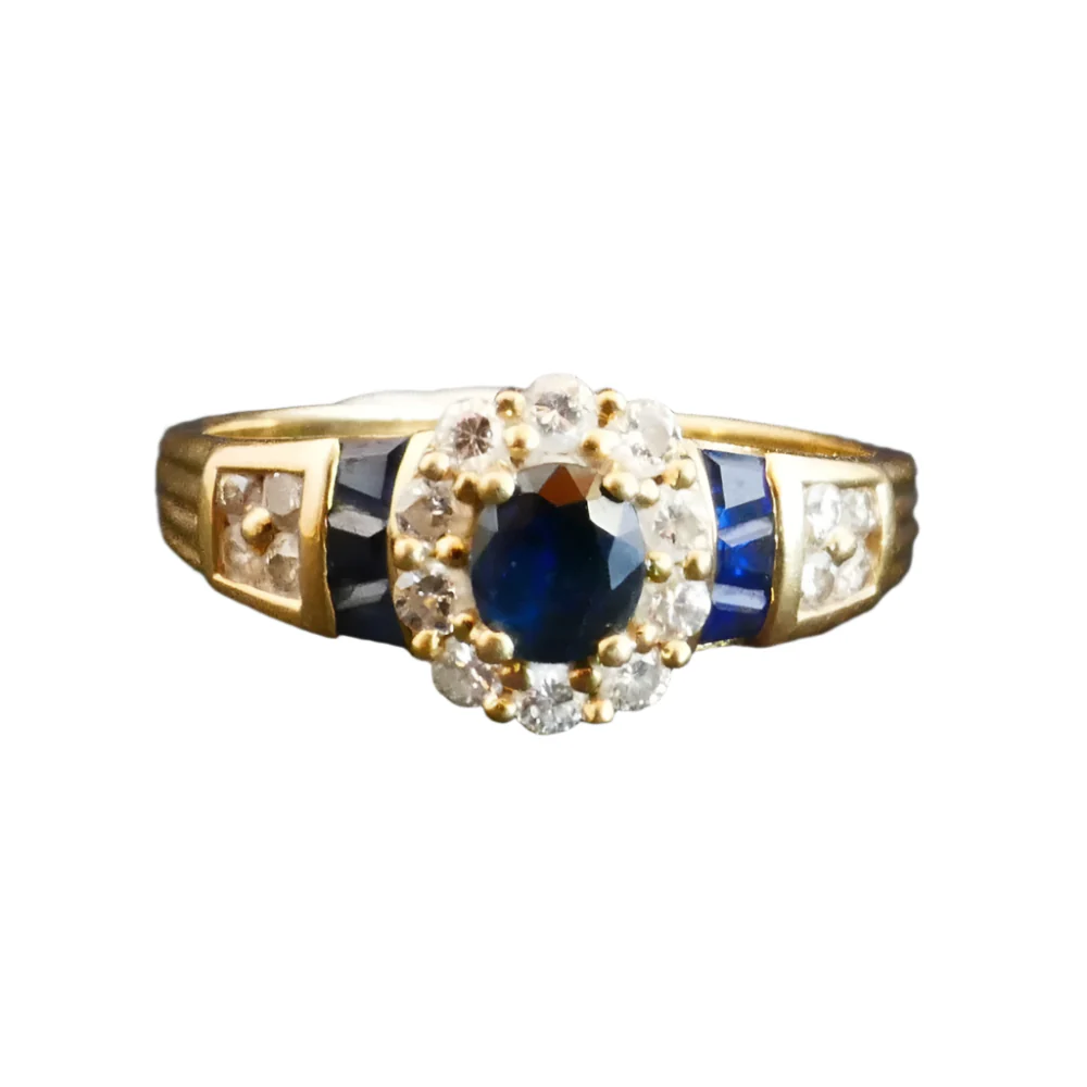 Bague en or jaune, saphirs et diamants