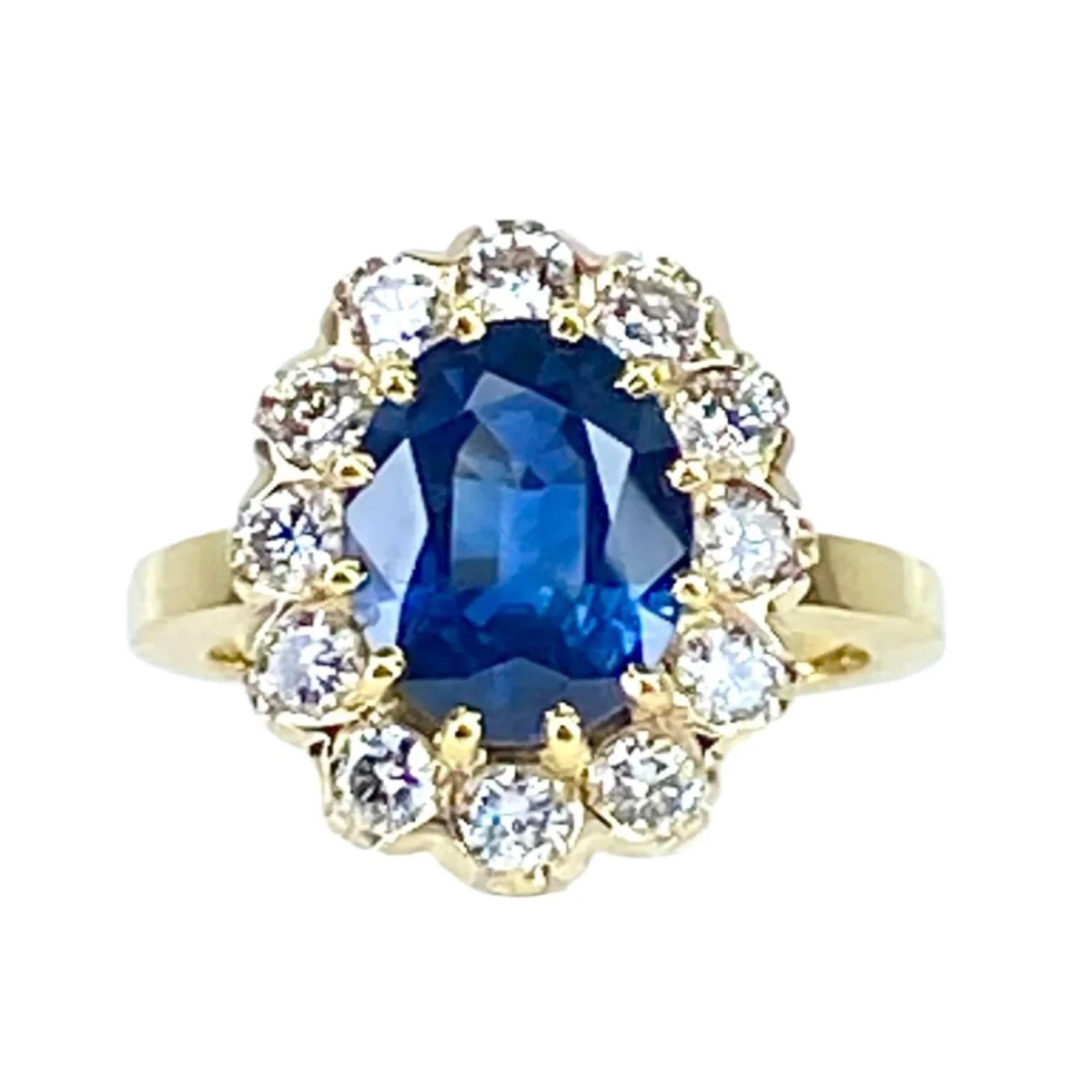 Bague marguerite en or 18 carats, saphir 3,50 carats et diamants