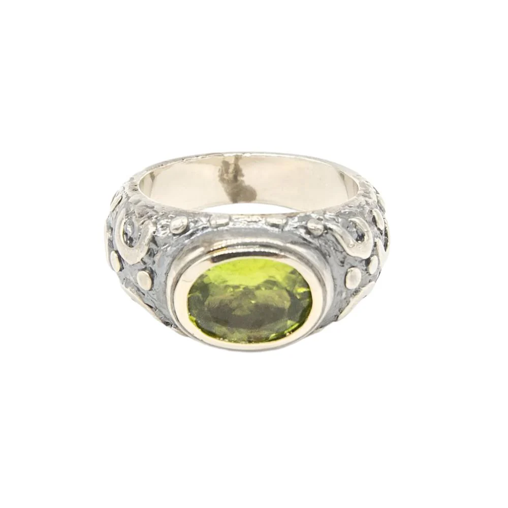 Bague Jonc en or jaune et argent et péridot