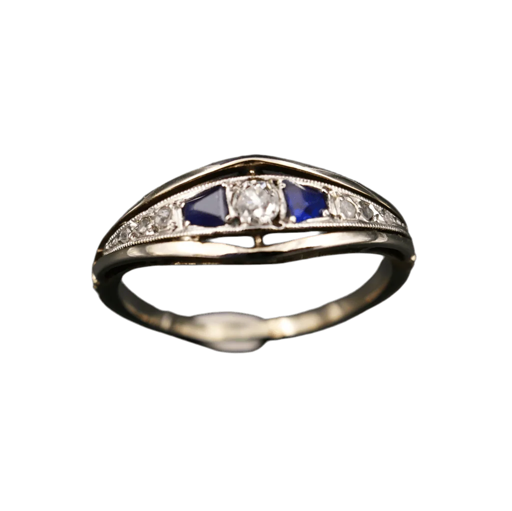 Bague Jarretière en or blanc, platine, saphirs et diamants
