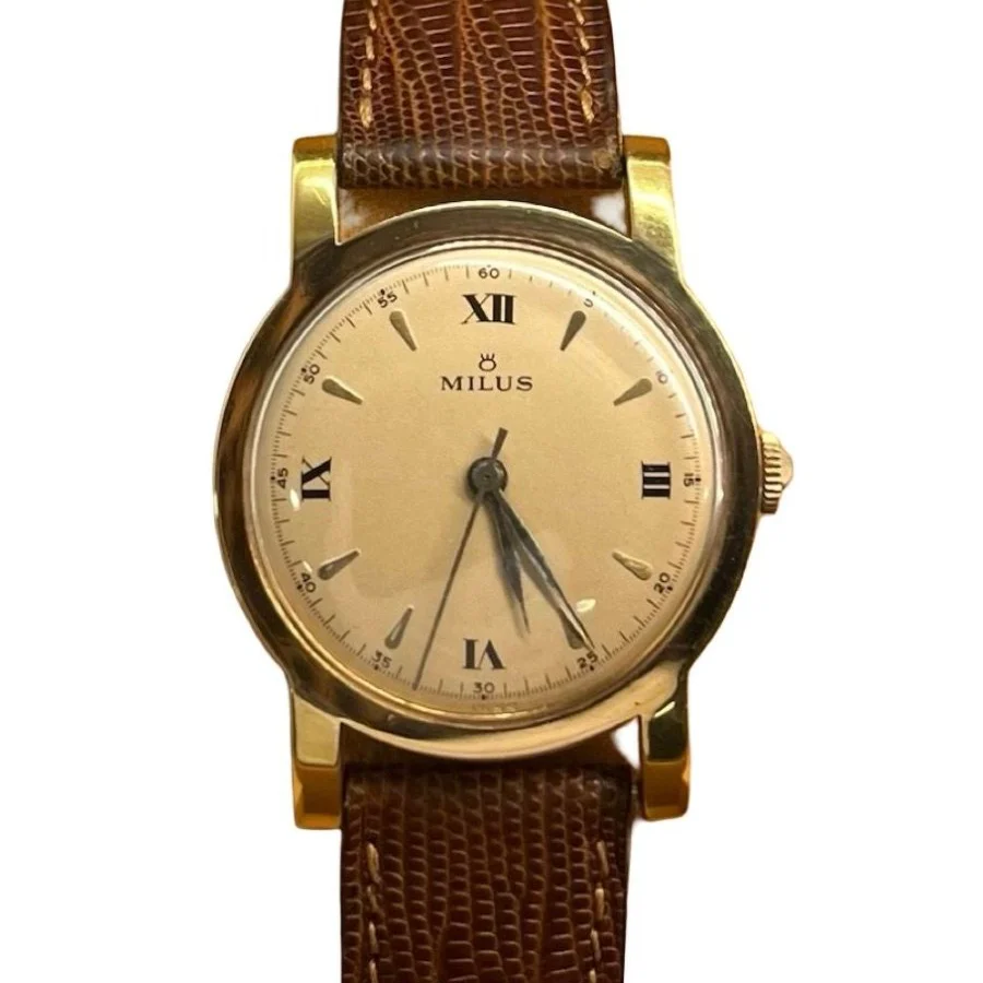 Montre MILUS Vintage en or jaune et cuir