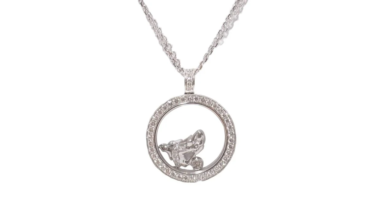 Collier CHOPARD "Happy Diamonds" en or blanc et diamants