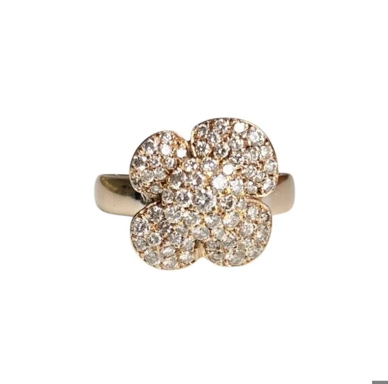 Bague en or jaune 18k en forme de fleur et diamants