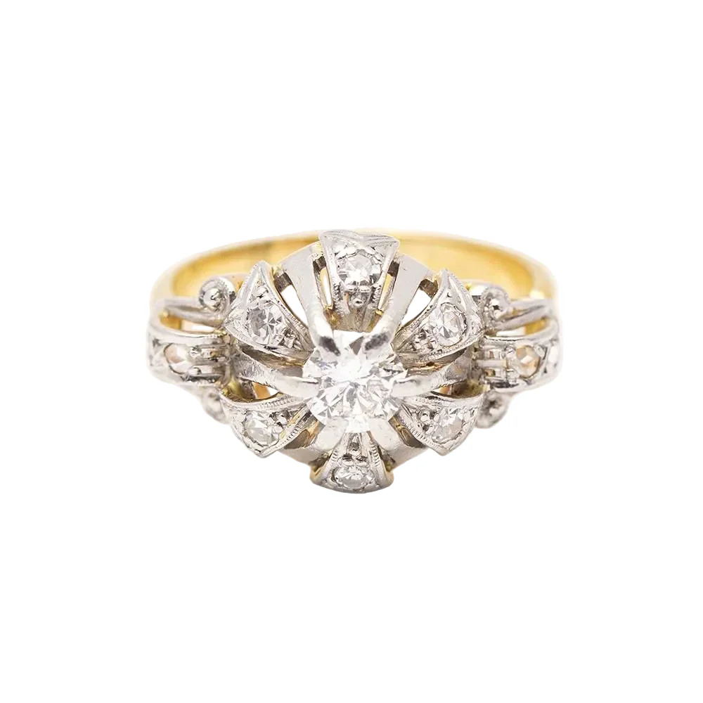 Bague en or jaune, platine et diamants.