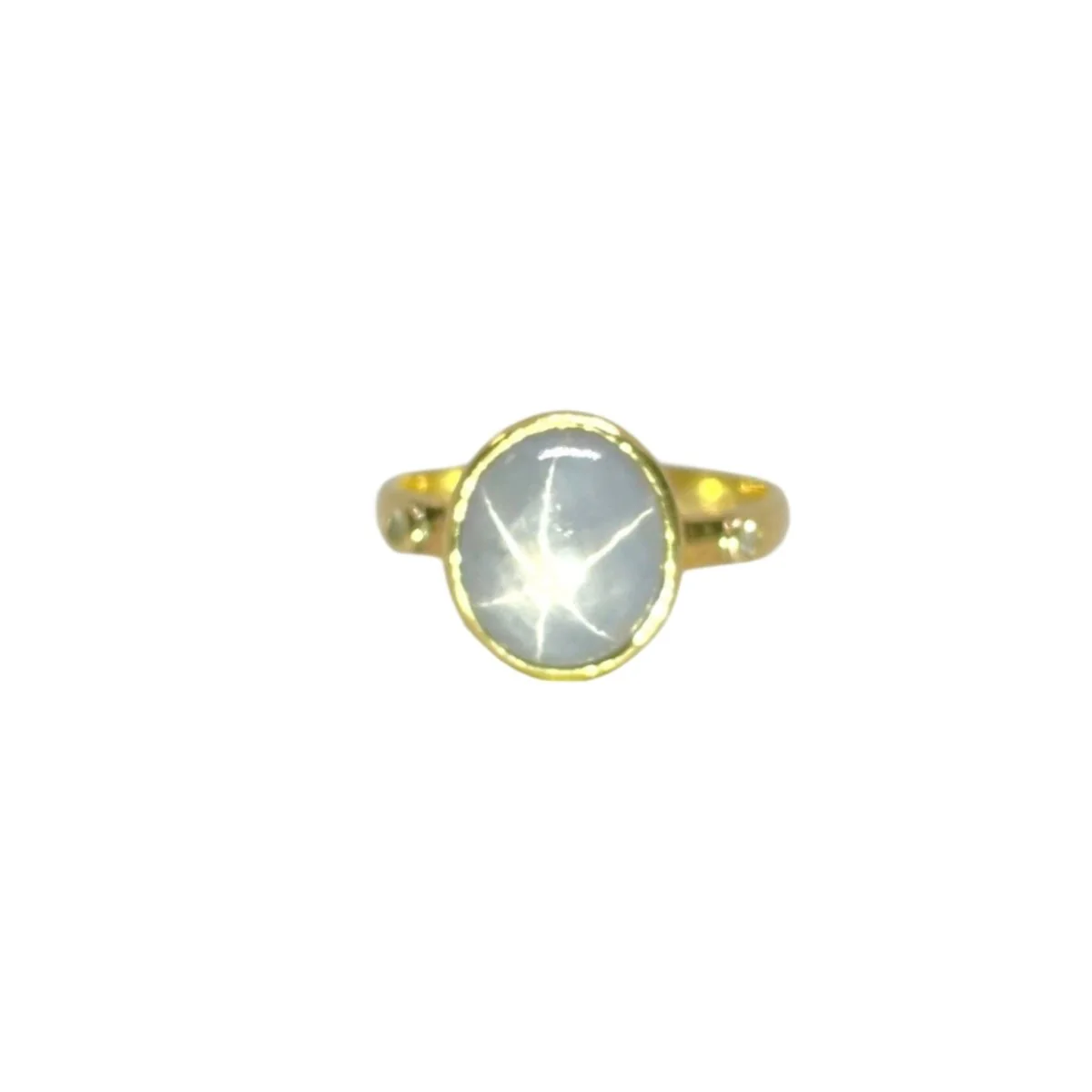 Bague en or jaune, saphir étoilé et diamants