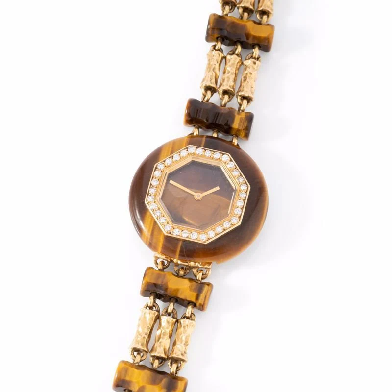 Montre BOUCHERON en or jaune, oeil de tigre et diamants