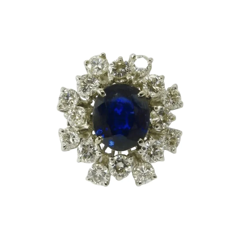 Bague Marguerite en or blanc, saphir, et diamants