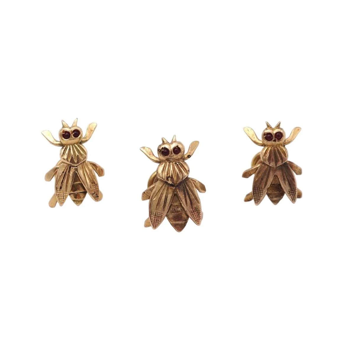 Broche en or jaune et grenats