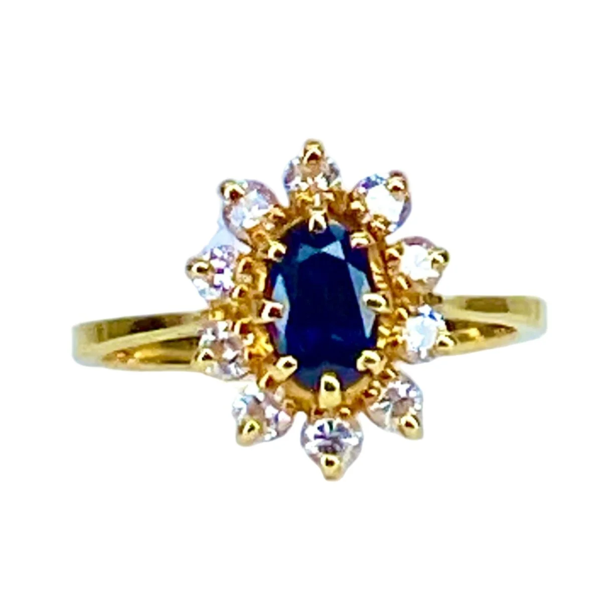 Bague marguerite en or jaune 18 carats, saphir et diamants