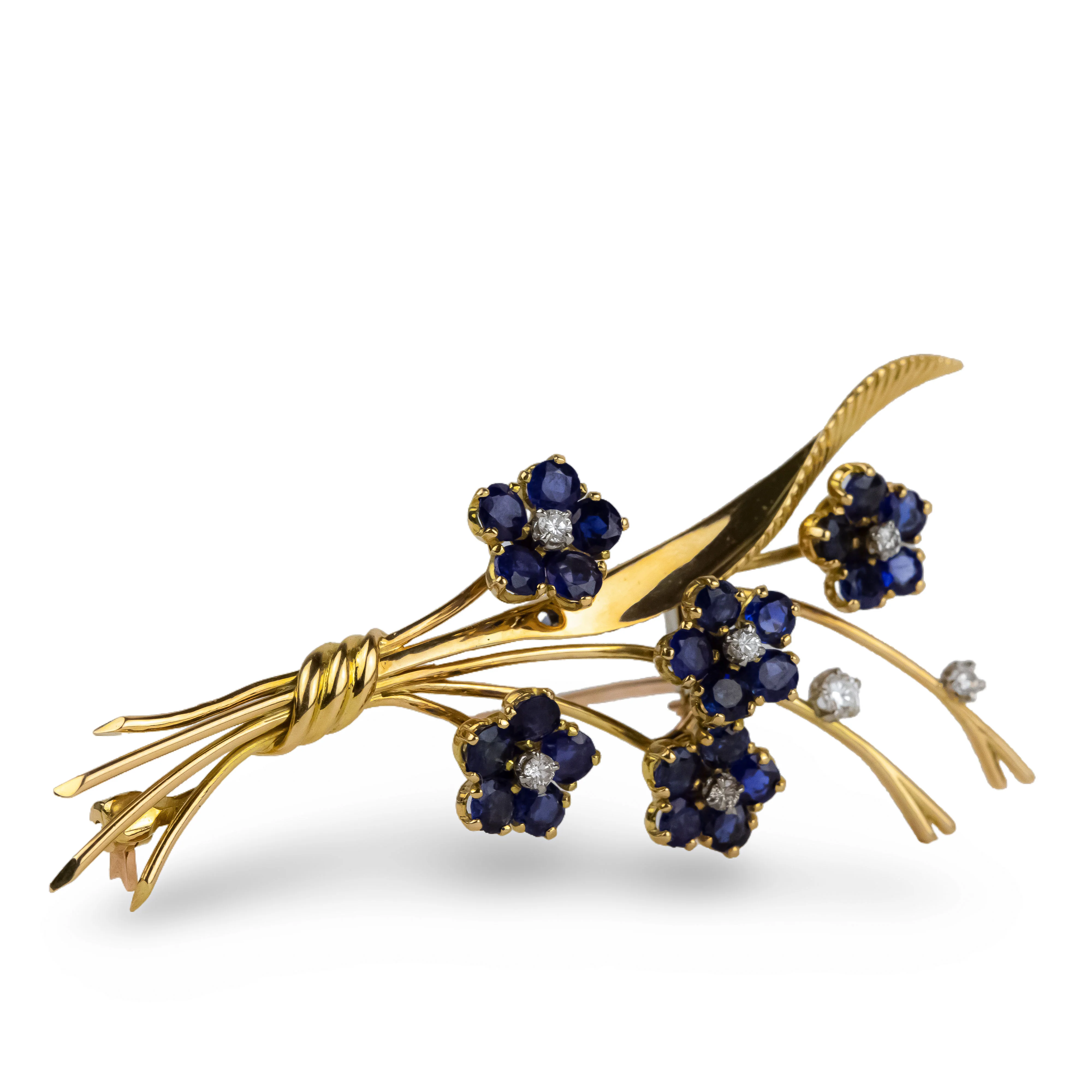 Broche Clip VAN CLEEF & ARPELS "Bouquet de fleurs" en or jaune et saphirs