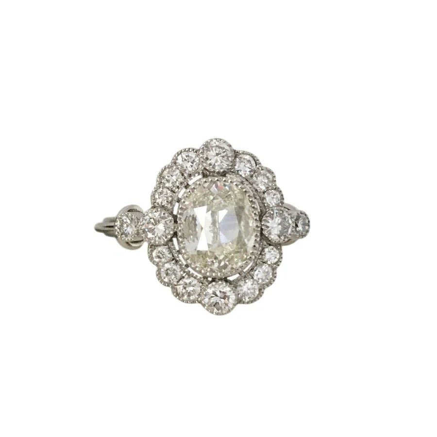 Bague Entourage en platine et diamants