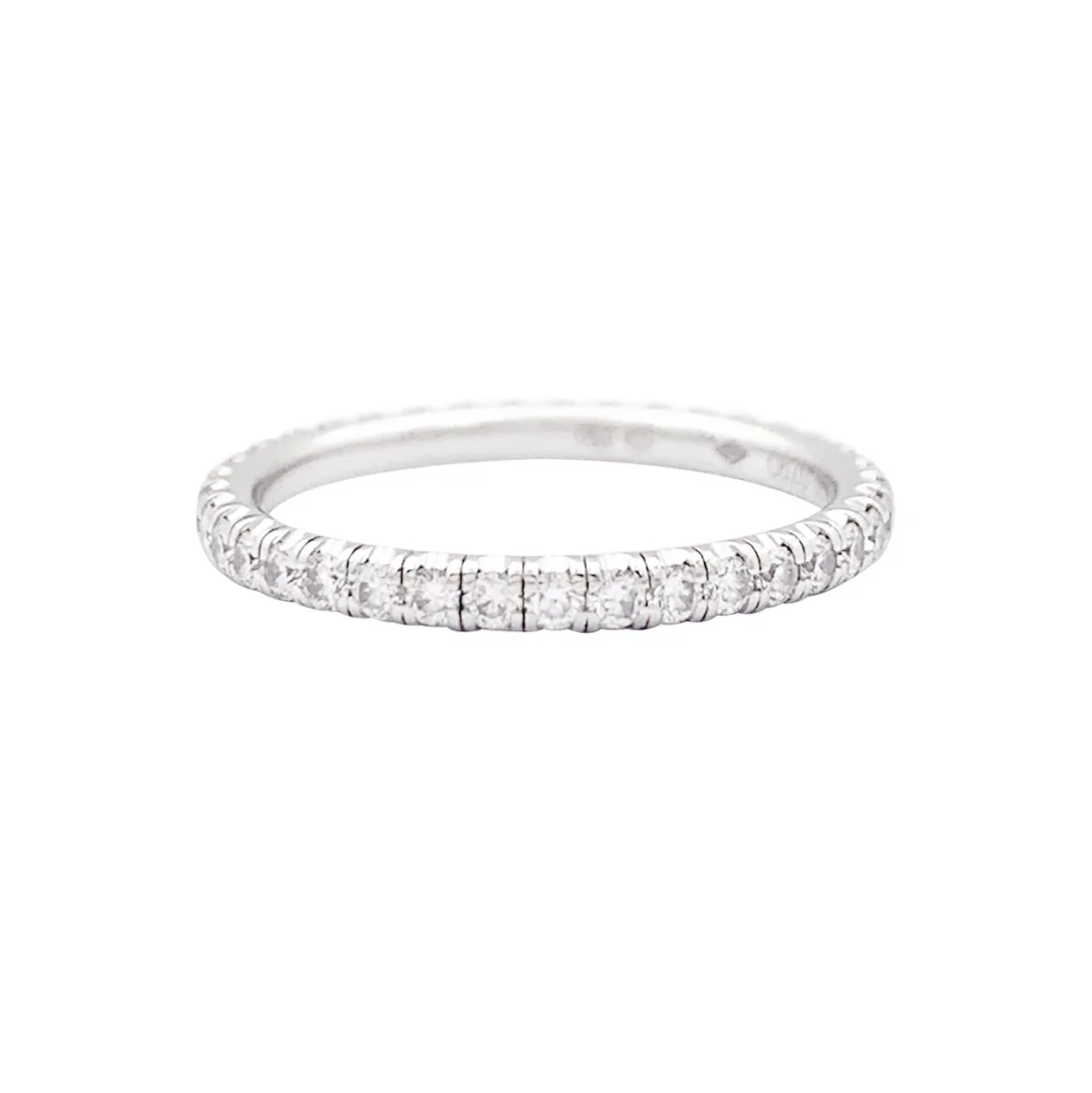 Alliance Cartier, "Etincelle", or blanc, diamants.