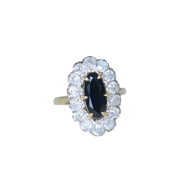Bague Marguerite en or jaune, or blanc, saphir et diamants