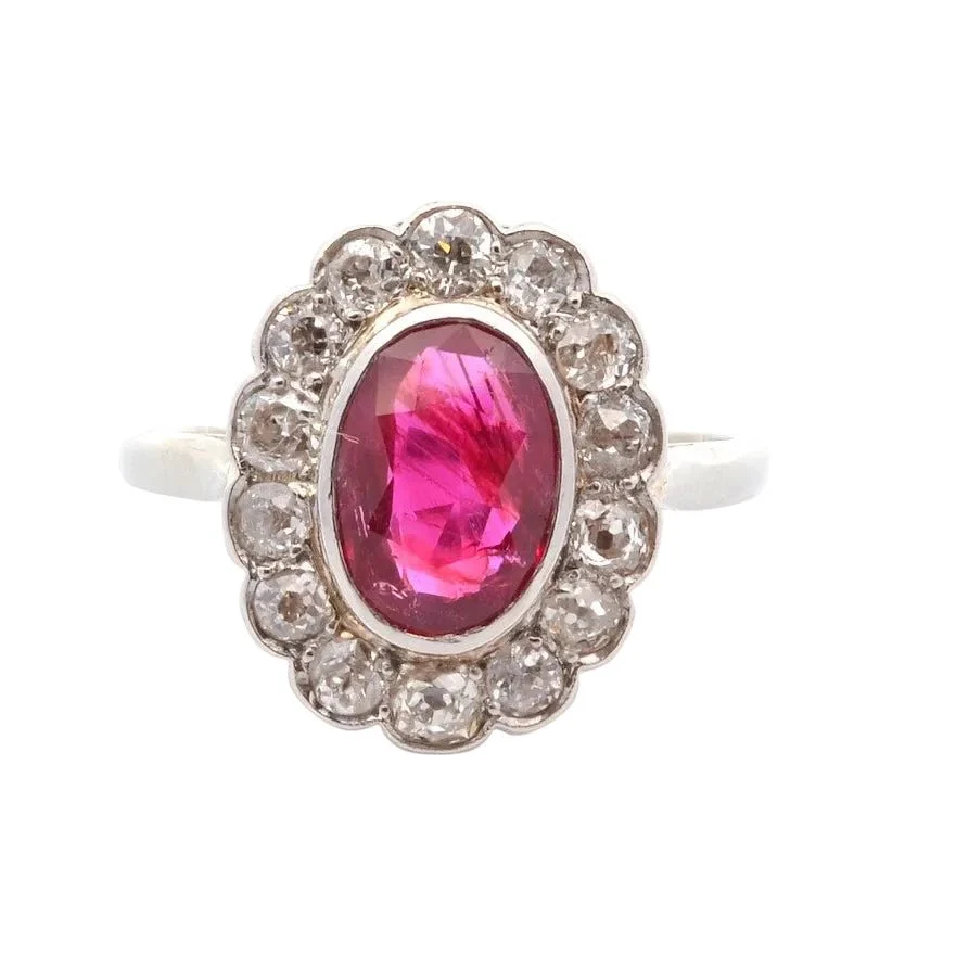 Bague Entourage en or blanc, rubis et diamants