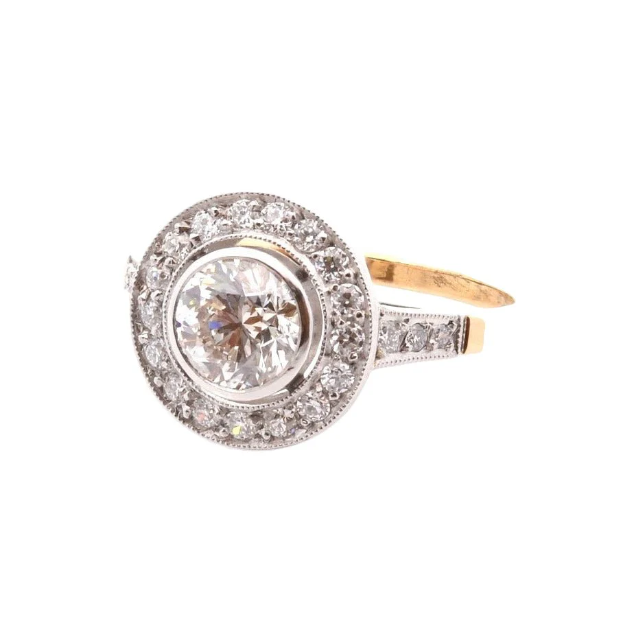 Bague Entourage en platine, or jaune, et diamants