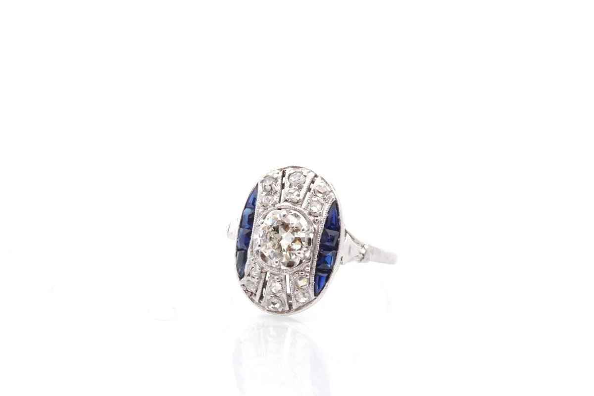 Bague art déco en platine et diamants saphirs