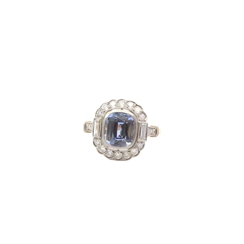 Bague Marguerite en or jaune, platine, saphir et diamants