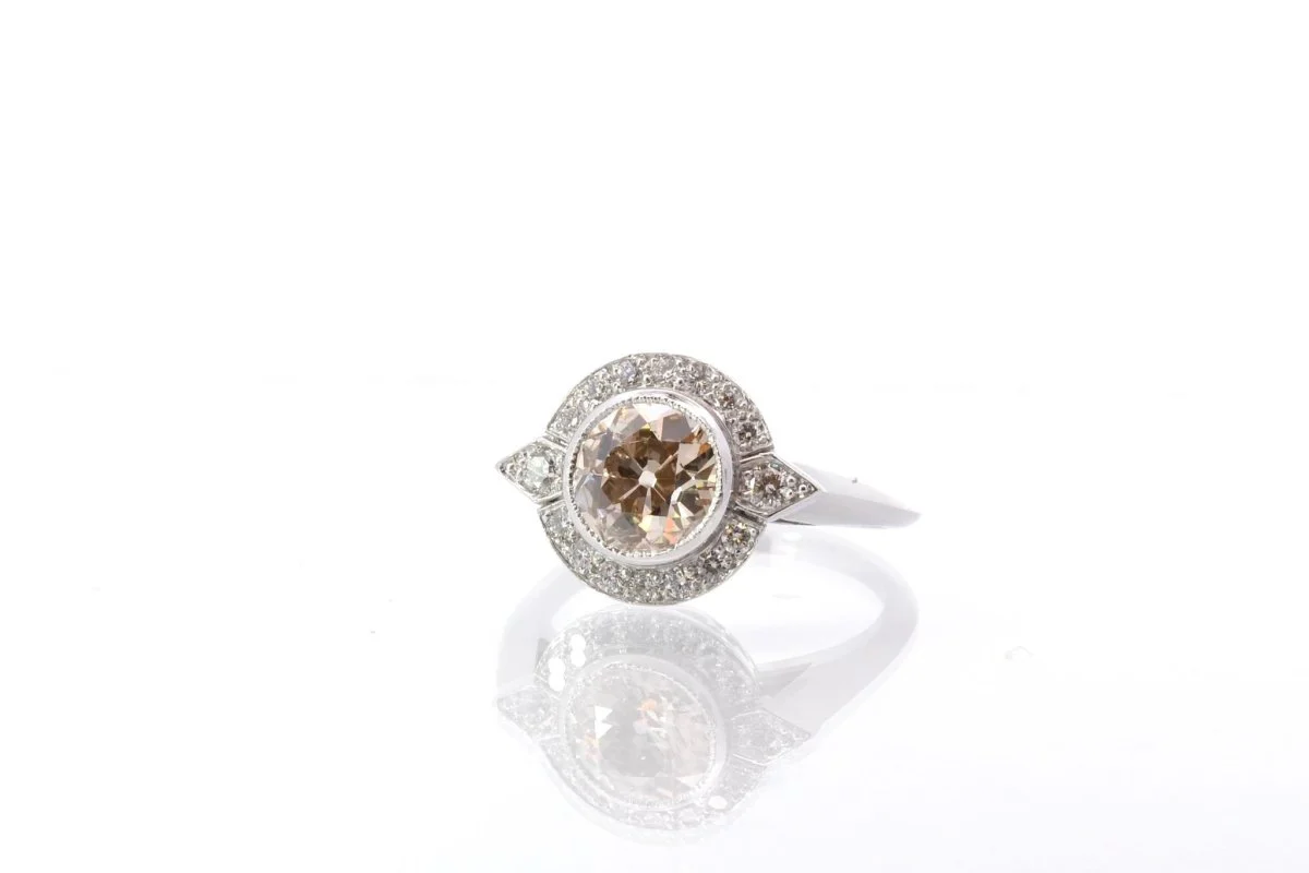 Bague entourage diamant et platine
