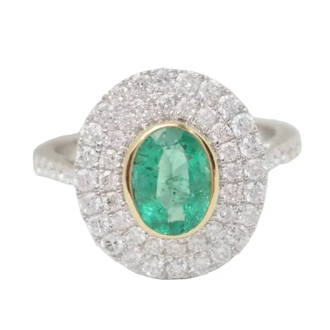 Bague Entourage en or jaune, or blanc, émeraude et diamants