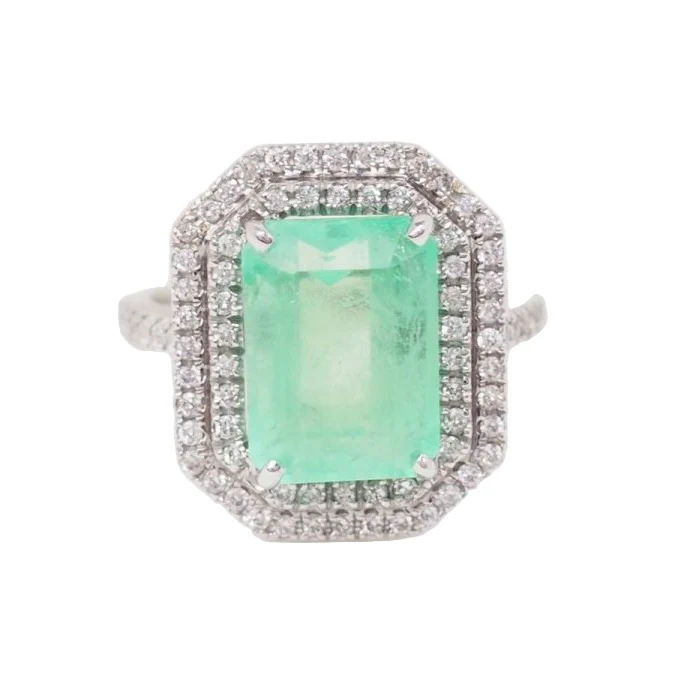 Bague double entourage en or blanc, émeraude de colombie certifiée et diamants