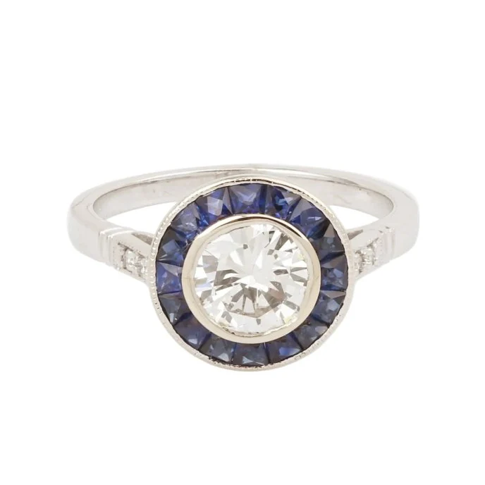 Bague Entourage en or blanc, saphirs et diamants