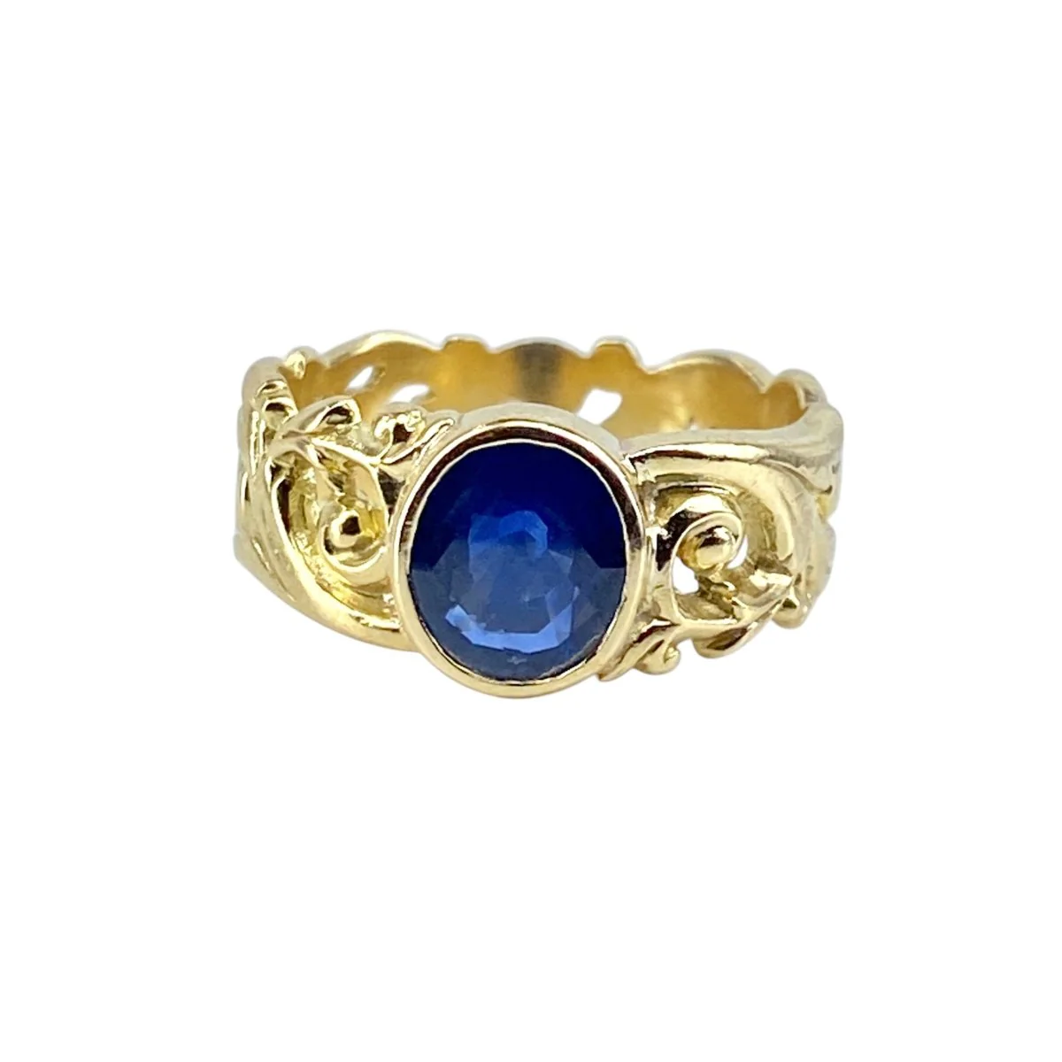 Bague en or jaune et saphir
