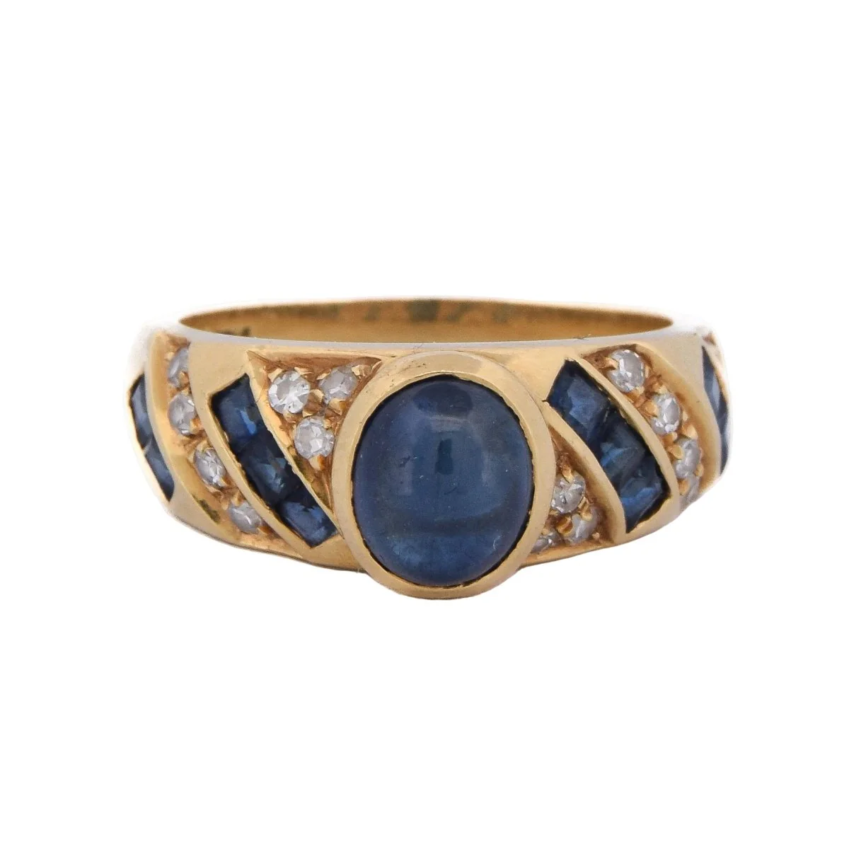Bague en or jaune, saphirs et diamants