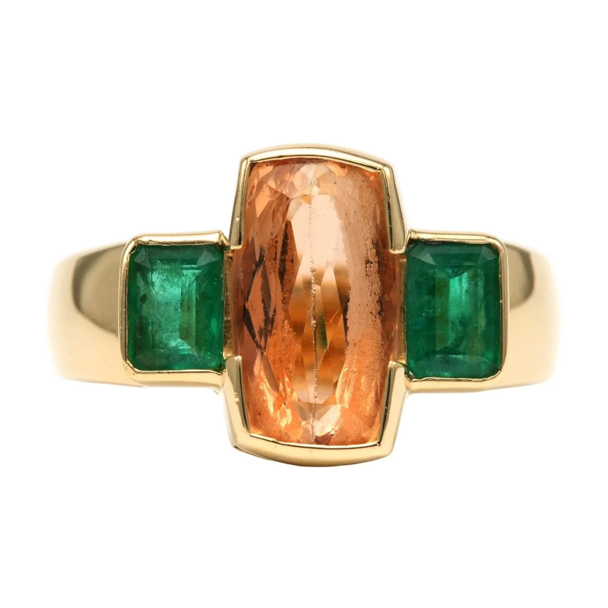 Bague en or jaune, topaze et émeraudes