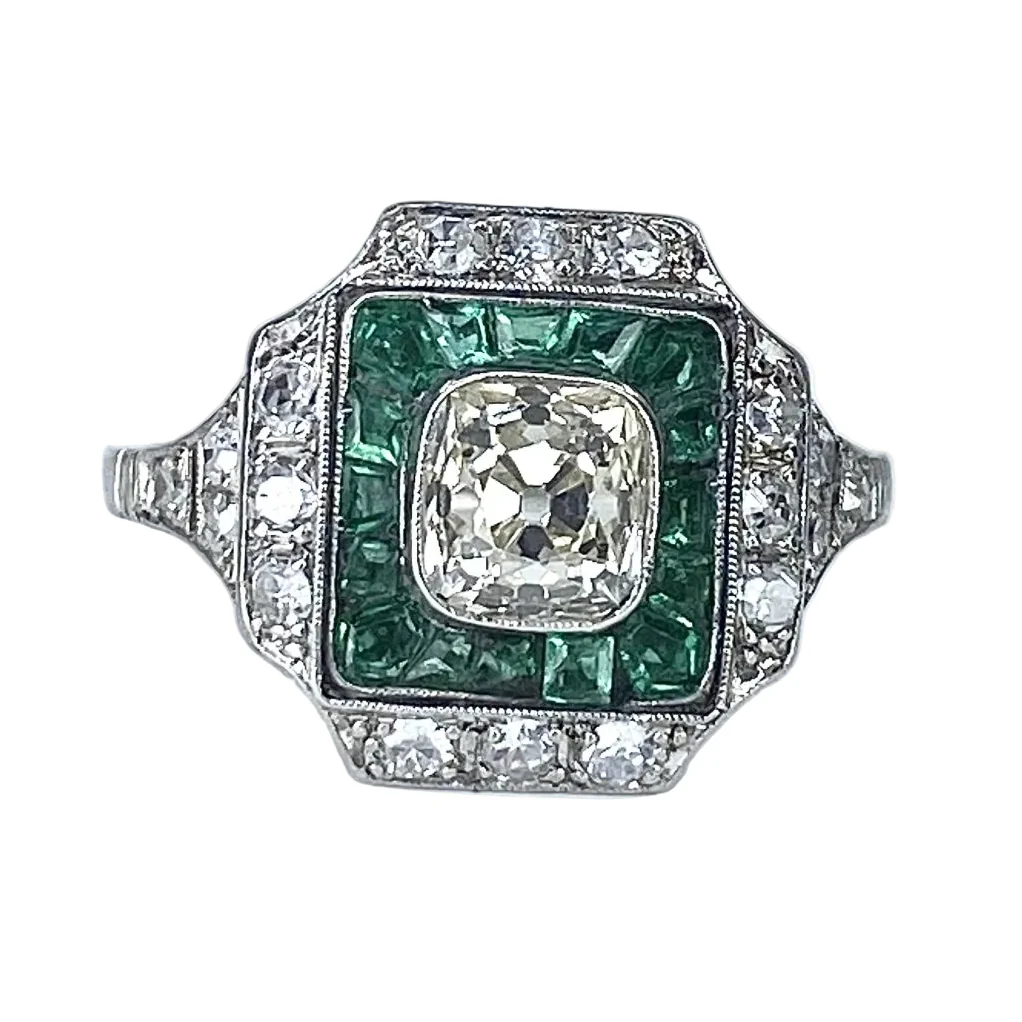 Bague Entourage en platine, émeraudes et diamants