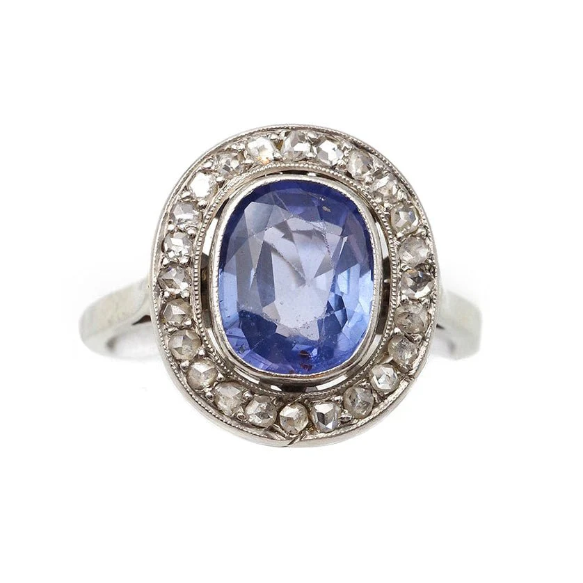 Bague Entourage en or blanc, platine, saphir et diamants