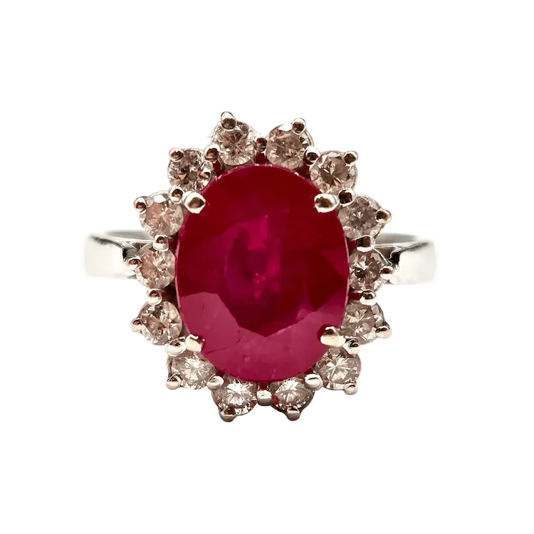Bague Entourage en or blanc, rubis et diamants