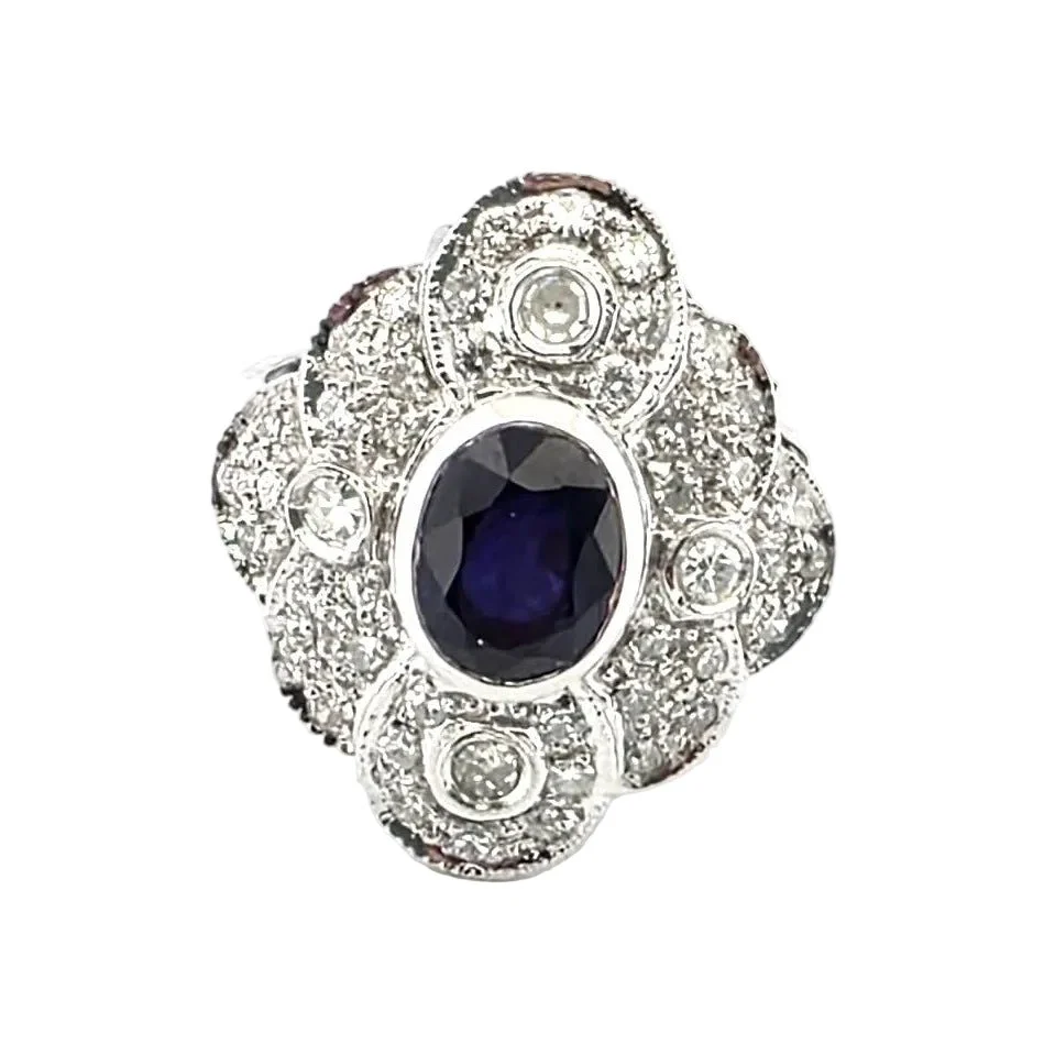 Bague Entourage en or blanc, saphir et diamants