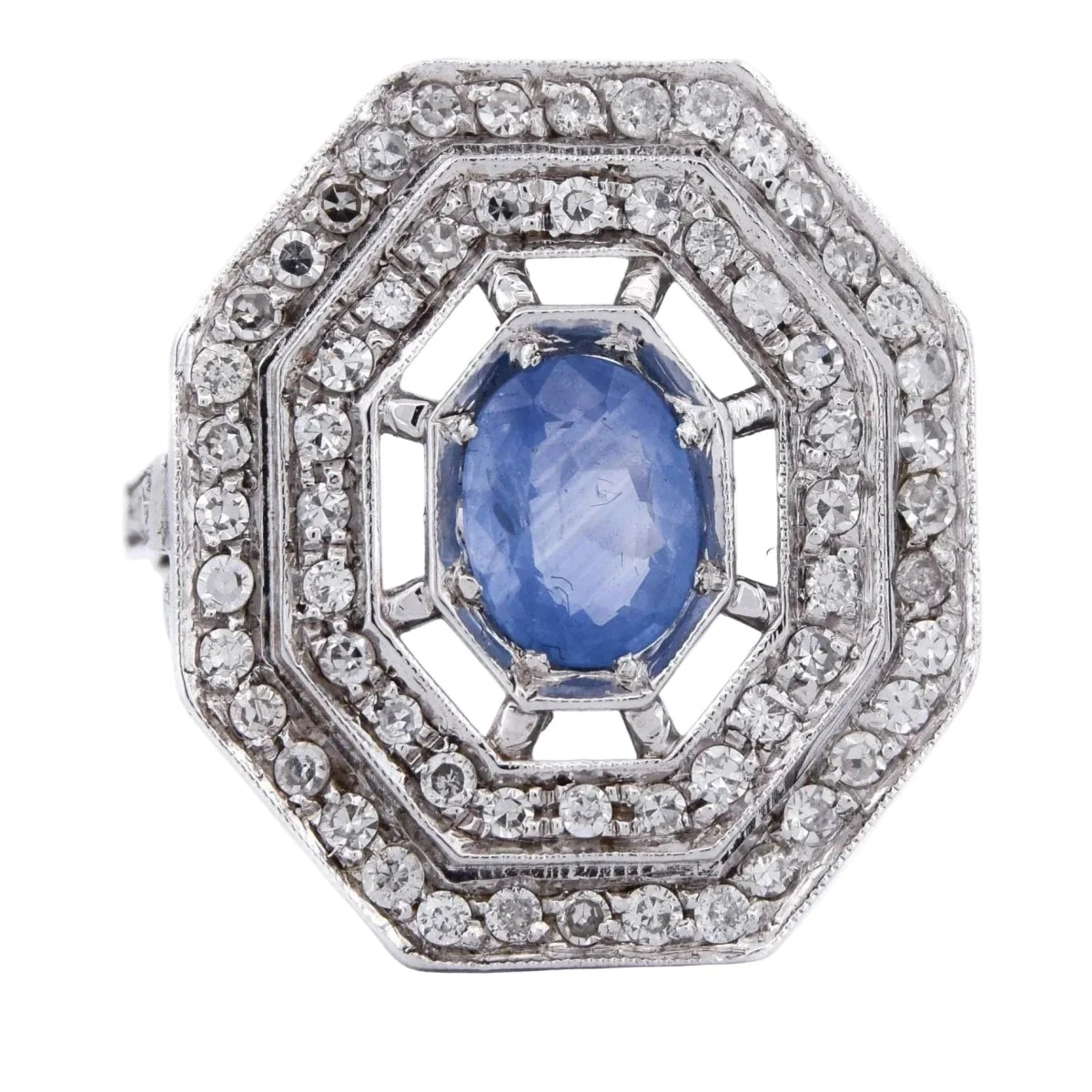 Bague Entourage en or blanc, saphir et diamants