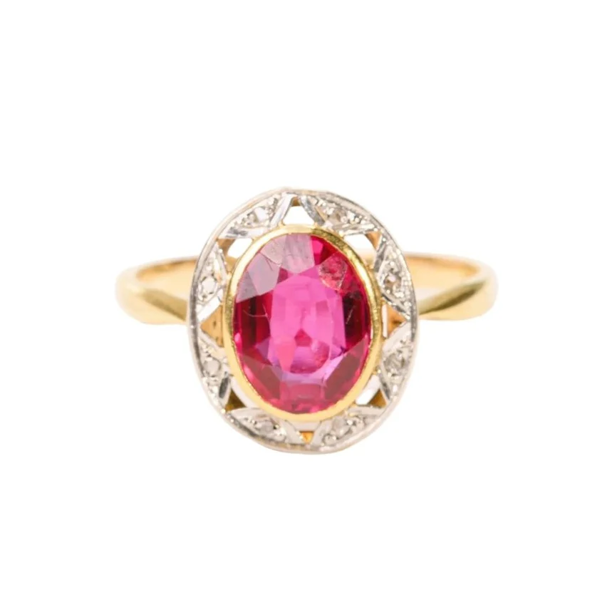 Bague Entourage en or jaune, platine, rubis et diamants