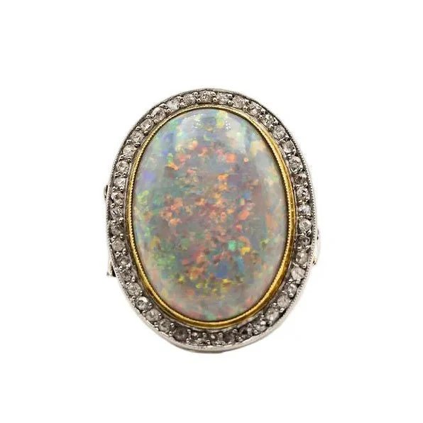Bague Entourage en platine, or jaune, opale et diamants