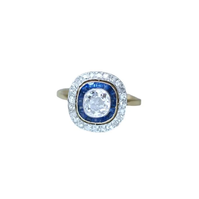 Bague Art Deco halo diamants et saphirs calibrés