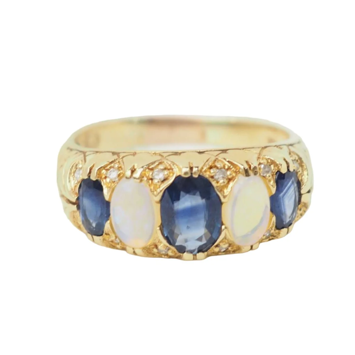 Bague jarretière en or jaune, saphirs et pierres de lune